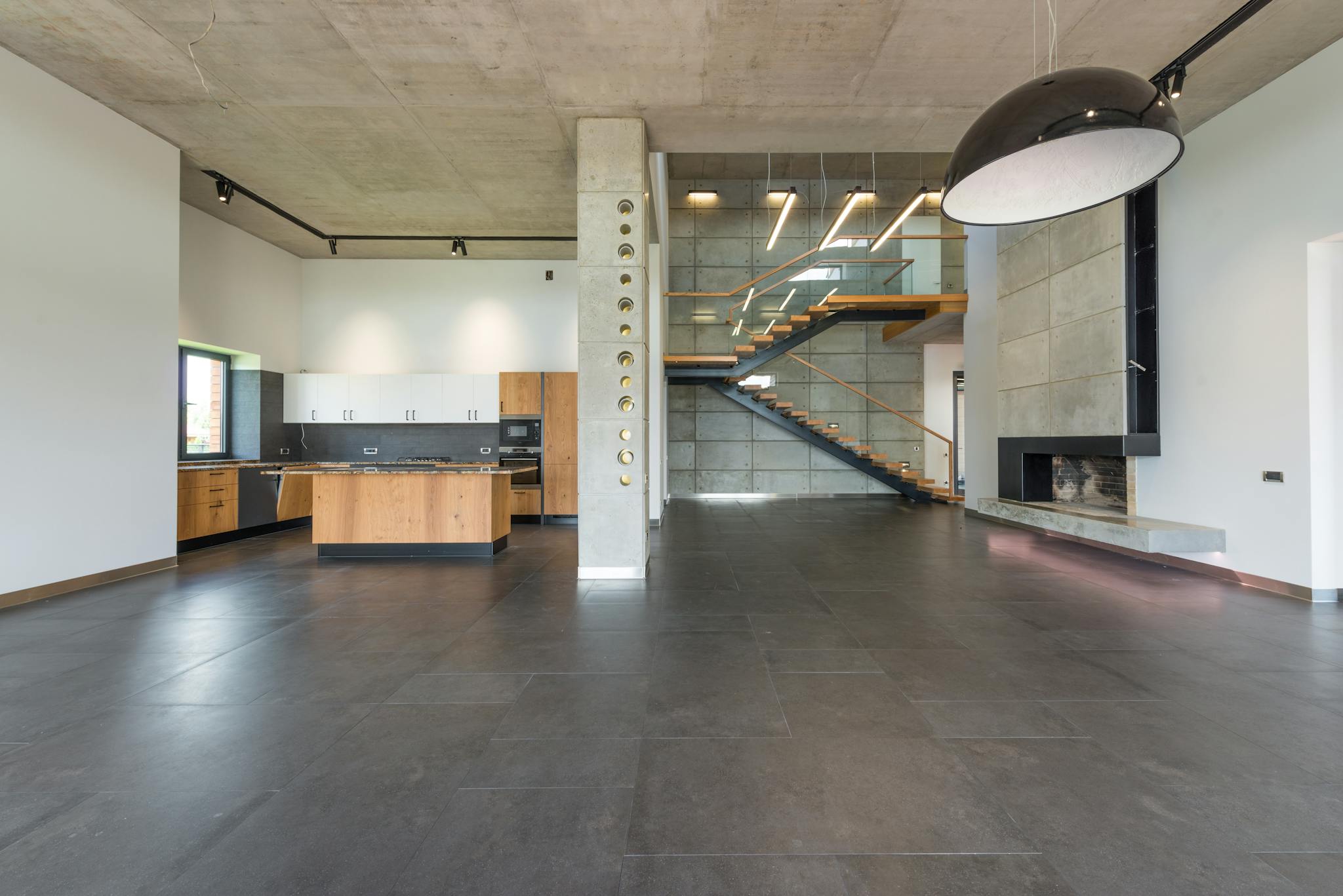 spacious loft hallway and open plan kitchen